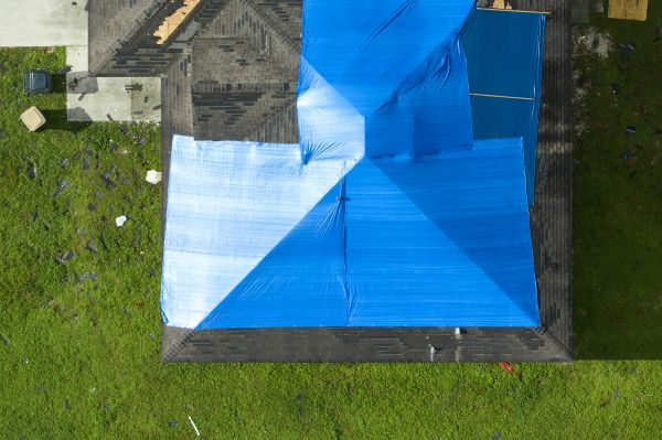 Tarp Roofing Installation